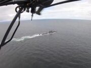 Wildcat helicopter airlifts patient from submarine