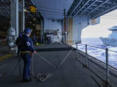 HMS Queen Elizabeth takes delivery of live munitions at sea