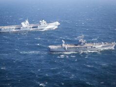 British aircraft carrier meets up with U.S. command ship