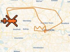 Military helicopter draws crown over London