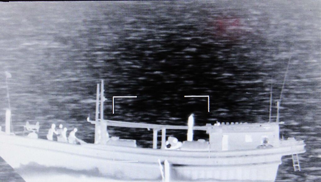 The boarding teams search the suspect craft