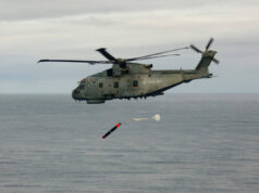 Helicopters from HMS Queen Elizabeth launch torpedos