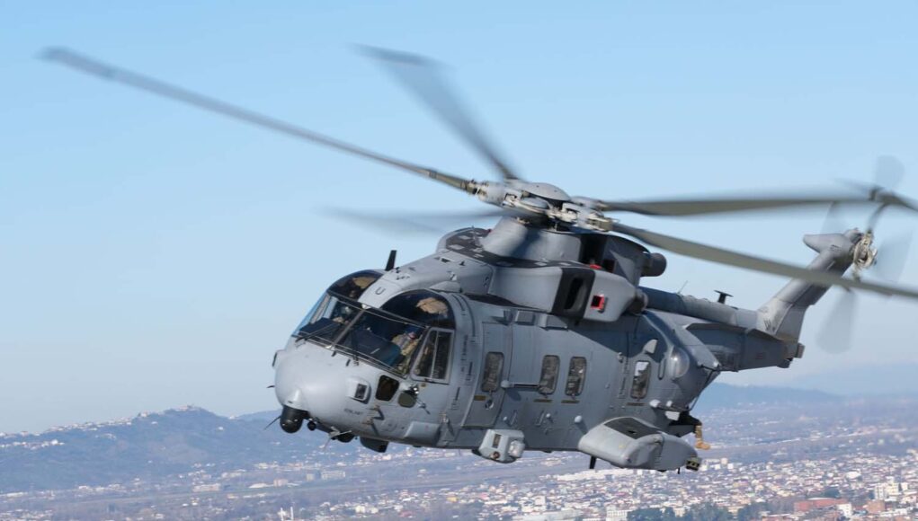 A Merlin Mk4 banks over Tirana