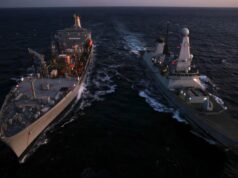 British warship shows battle-earned scorch marks