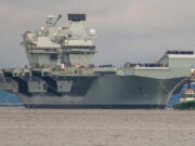 Britain’s flagship aircraft carrier returning home after repairs