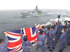 Japanese warship salutes HMS Tyne with British flag display