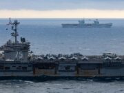 British and U.S. carriers sail together to show naval power