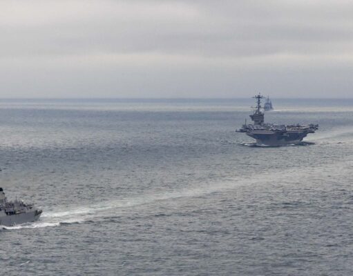 American supercarrier heads in for multi-billion refit