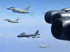 British fighters escort American bombers over Middle East