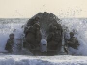 Commandos conduct surf drills for raiding operations