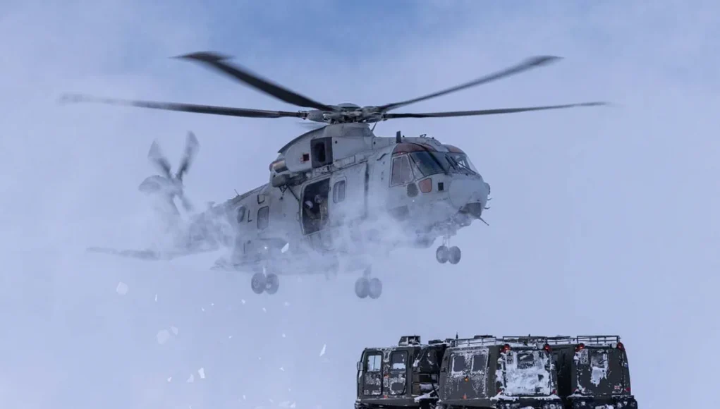 An 845 NAS Merlin stirs up snow on NATO exercises in Norway