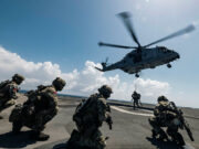 British Commandos fast-rope onto aircraft carrier