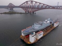 Images show frigate on barge at Rosyth ahead of float off