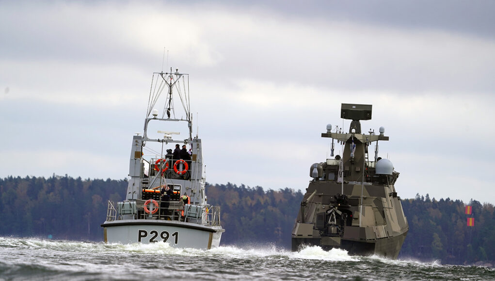 HMS Puncher (left) follows FNS Hamina off the Finnish coast