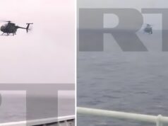 U.S. special forces heli seen alongside sanctioned tanker