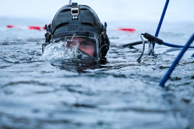 American and Estonian divers train under ice in Baltic
