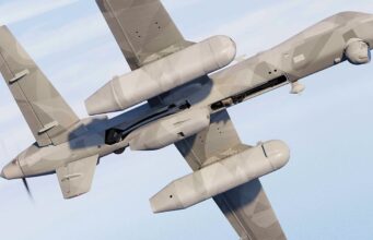 MQ-9B drone gets airborne early warning capability Military unmanned drone in flight with its open payload bay visible.