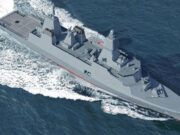 Modern gray destroyer cruising through open sea, bow to the right, leaving a frothy wake behind.
