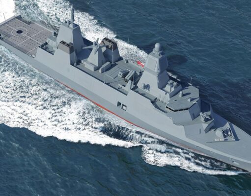 Modern gray destroyer cruising through open sea, bow to the right, leaving a frothy wake behind.