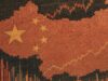 Cracked red silhouette of China with yellow stars over a rising stock chart background.