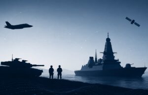 Silhouetted military scene with a tank on shore, two soldiers, a battleship, a jet overhead, and a satellite in a blue sky.