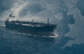 Large oil tanker sailing on choppy blue ocean with a map-like blue overlay in the background, conveying global shipping routes