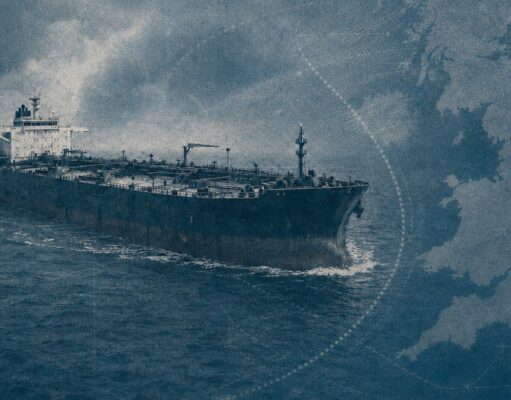 Large oil tanker sailing on choppy blue ocean with a map-like blue overlay in the background, conveying global shipping routes