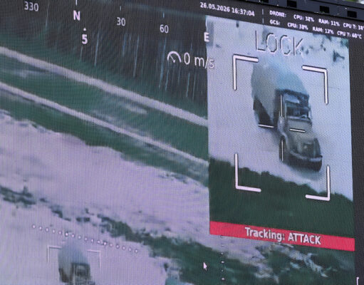 NATO has a counter-drone problem – inside the race to fix it Surveillance display highlighting a truck on a road, with a crosshair overlay and a red 'Tracking ATTACK' label below the image.