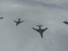 American bombers ‘ready to strike’ over the North Sea Six military aircraft flying in a loose formation across a cloudy sky.
