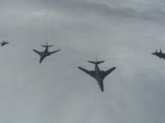 American bombers ‘ready to strike’ over the North Sea Six military aircraft flying in a loose formation across a cloudy sky.