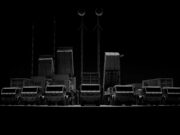 CSG unveils Trident layered air defence at Eurosatory Row of large trucks with tall antenna masts silhouetted against a dark background, forming a straight line.