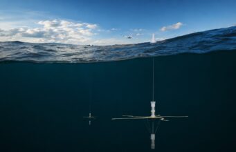 Ultra Maritime trials next-gen sub-hunting sonobuoy in UK Underwater research mooring: a vertical instrument with cross-shaped sensor hanging from a line beneath the surface of dark blue water.