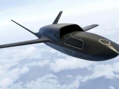 Airbus unveils Ravenstorm combat drone A sleek, black concept aircraft gliding above a cloudy sky with long, slender wings.