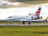 Britain pauses plan to militarise VIP transport jets White business jet with Union Jack tail taxiing on a runway under a cloudy sky