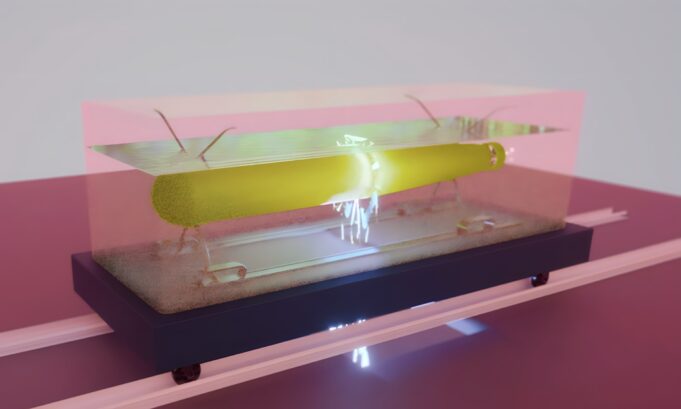 QinetiQ boosts UK mine-hunting drone testing at Portland Abstract yellow sculpture under a glass cover on a dark pedestal in a gallery.