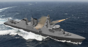 Grey naval warship at sea fires a missile from its launcher, with a helicopter on the aft deck and waves splashing nearby (hull number T31).