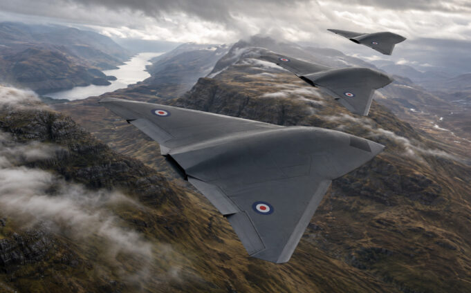 Storm Fighter drones to provide UK air and missile defence Three RAF flying-wing aircraft in formation above a winding fjord and rugged mountains in the distance.