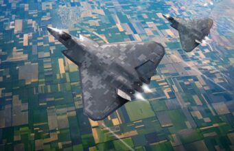Huge contract awarded for new British fighter jet Two digital-camouflage stealth jets flying over patchwork fields, viewed from above, with contrails behind them.