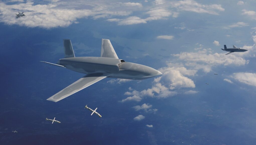 V2_GAMBIT-6-MKTG-IMAGES_L19212 Large stealth bomber drone cruising high above clouds as several smaller munitions fall away beneath it.