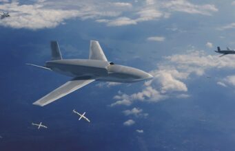 SPEAR missile heading for MQ-9B drones and Gambit CCA Large stealth bomber drone cruising high above clouds as several smaller munitions fall away beneath it.