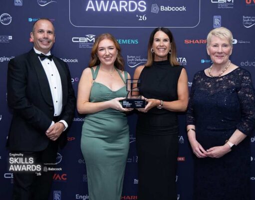 Babcock takes two wins at Enginuity Skills Awards 2026 Four people in formal wear posing with a trophy at an awards ceremony backdrop.