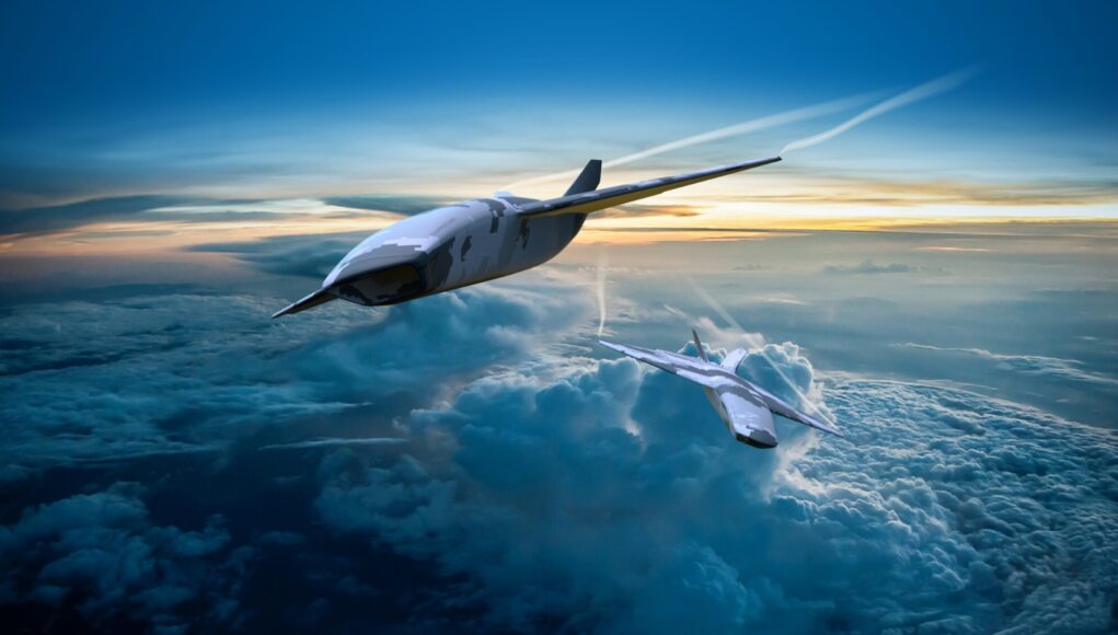 cca Two sleek, futuristic aircraft in formation above a cloud layer at sunset.