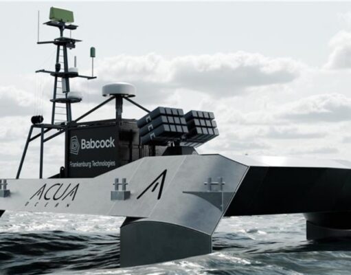 Babcock signs deal to explore armed drone boats Autonomous research vessel at sea with a tall mast and sensor arrays on deck.