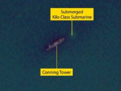 Russian subs submerge in harbour fearing Ukrainian drones Submerged Kilo-class submarine with its conning tower visible underwater labeled in yellow boxes and lines to the parts.