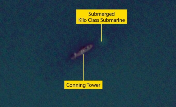 Russian subs submerge in harbour fearing Ukrainian drones Submerged Kilo-class submarine with its conning tower visible underwater labeled in yellow boxes and lines to the parts.