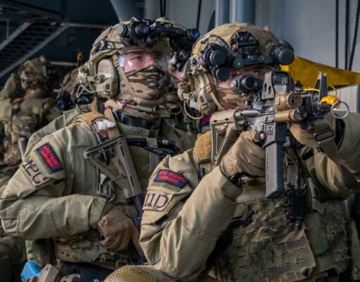 British forces board German warship by air and sea
